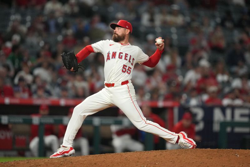 Jun 17, 2024; Anaheim, California, USA; Los Angeles Angels relief pitcher Matt Moore (55) throws in the eighth inning against the Milwaukee Brewers at Angel Stadium. Mandatory Credit: Kirby Lee-USA TODAY Sports