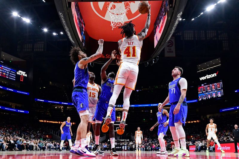 ATLANTA, GA - JANUARY 26: Saddiq Bey #41 of the Atlanta Hawks drives to the basket during the game against the Dallas Mavericks on January 26, 2024 at State Farm Arena in Atlanta, Georgia.  NOTE TO USER: User expressly acknowledges and agrees that, by downloading and/or using this Photograph, user is consenting to the terms and conditions of the Getty Images License Agreement. Mandatory Copyright Notice: Copyright 2024 NBAE (Photo by Adam Hagy/NBAE via Getty Images)