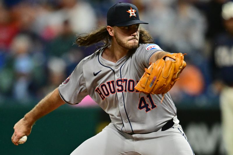 Sep 27, 2024; Cleveland, Ohio, USA; Houston Astros starting pitcher Spencer Arrighetti (41) throws a pitch during the sixth inning against the Cleveland Guardians at Progressive Field. Mandatory Credit: Ken Blaze-Imagn Images