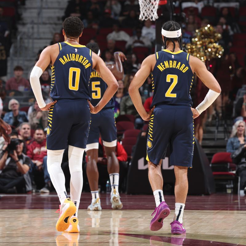 Cleveland, OH - OCTOBER 10: Tyrese Haliburton #0 and Andrew Nembhard #2 of the Indiana Pacers look on during the game against the Cleveland Cavaliers during a NBA pre season game on October 10, 2024 at Rocket Mortgage Fieldhouse in Cleveland, Ohio. NOTE TO USER: User expressly acknowledges and agrees that, by downloading and or using this photograph, User is consenting to the terms and conditions of the Getty Images License Agreement. Mandatory Copyright Notice: Copyright 2024 NBAE (Photo by Jeff Haynes/NBAE via Getty Images)