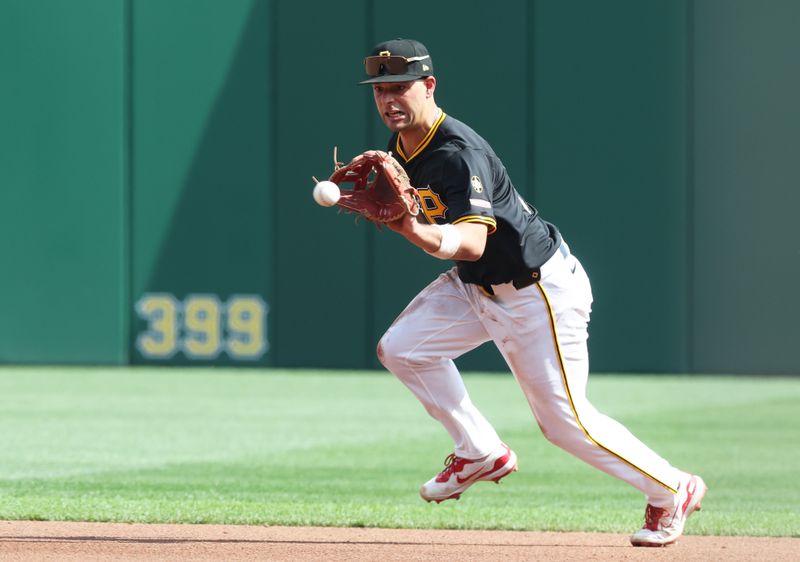 Sep 21, 2025; Pittsburgh, Pennsylvania, USA;  Pittsburgh Pirates second baseman Nick Yorke (38) fields a ground ball for an out against Athletics right fielder Carlos Cortes (not pictured) during the fourth inning at PNC Park. Mandatory Credit: Charles LeClaire-Imagn Images