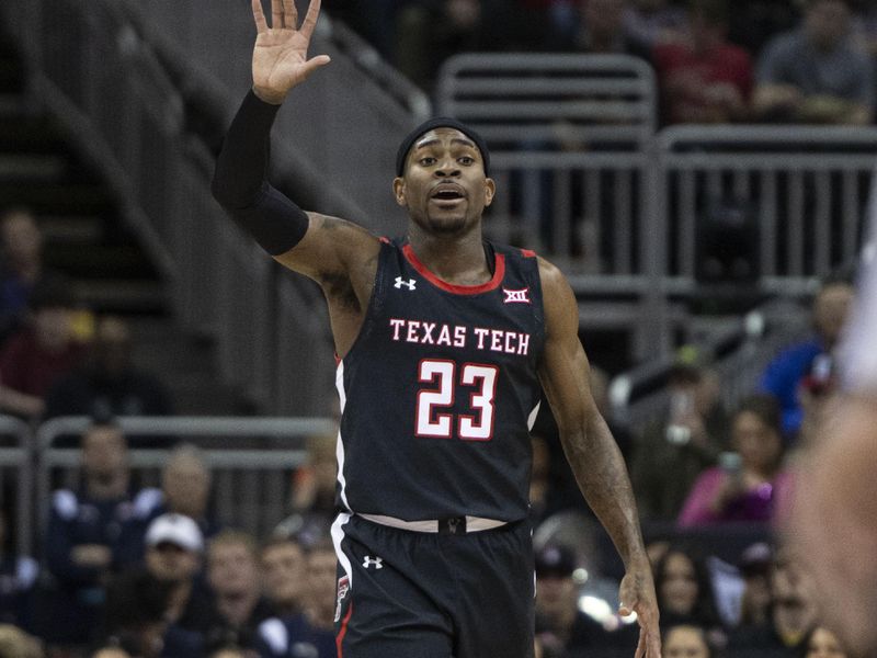 Mar 8, 2023; Kansas City, MO, USA; Texas Tech Red Raiders guard De'Vion Harmon (23) handles the ball against the West Virginia Mountaineers in the first half at T-Mobile Center. Mandatory Credit: Amy Kontras-USA TODAY Sports