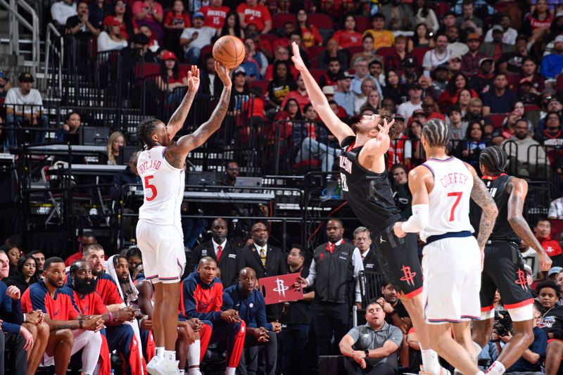 HOUSTON, TX - NOVEMBER 13:  Bones Hyland #5 of the LA Clippers shoots the ball during the game against the Houston Rockets on November 13, 2024 at the Toyota Center in Houston, Texas. NOTE TO USER: User expressly acknowledges and agrees that, by downloading and or using this photograph, User is consenting to the terms and conditions of the Getty Images License Agreement. Mandatory Copyright Notice: Copyright 2024 NBAE (Photo by Logan Riely/NBAE via Getty Images)