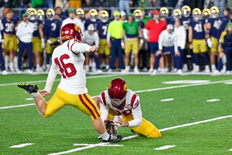 Oct 14, 2023; South Bend, Indiana, USA; USC Trojans kicker Denis Lynch (46) kicks a field goal in the first quarter against the Notre Dame Fighting Irish at Notre Dame Stadium. Mandatory Credit: Matt Cashore-USA TODAY Sports