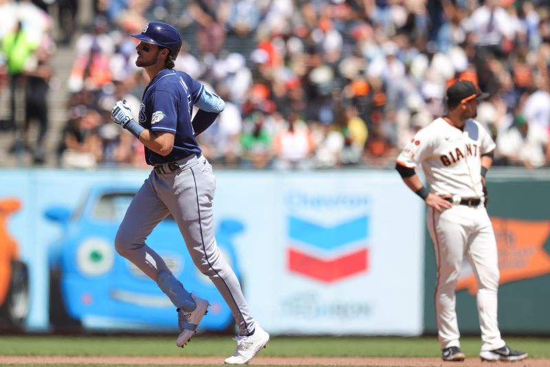 Aug 16, 2023; San Francisco, California, USA; Tampa Bay Rays right fielder Josh Lowe (15) hits a one run home run during the fourth inning against the San Francisco Giants at Oracle Park. Mandatory Credit: Sergio Estrada-USA TODAY Sports