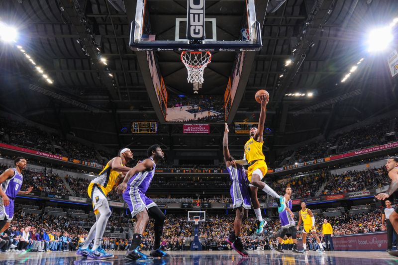 INDIANAPOLIS, IN - FEBUARY 3:  Buddy Hield #24 of the Indiana Pacers drives to the basket during the game on Febuary 3, 2023 at Gainbridge Fieldhouse in Indianapolis, Indiana. NOTE TO USER: User expressly acknowledges and agrees that, by downloading and or using this Photograph, user is consenting to the terms and conditions of the Getty Images License Agreement. Mandatory Copyright Notice: Copyright 2023 NBAE (Photo by Ron Hoskins/NBAE via Getty Images)