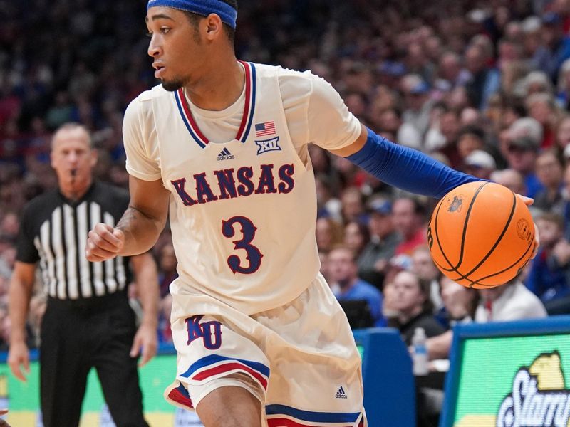 Dec 22, 2023; Lawrence, Kansas, USA; Kansas Jayhawks guard Dajuan Harris Jr. (3) dribbles the ball against the Yale Bulldogs during the second half at Allen Fieldhouse. Mandatory Credit: Denny Medley-USA TODAY Sports