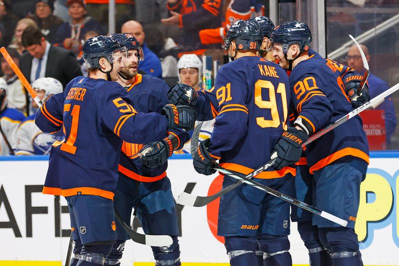 Mar 21, 2024; Edmonton, Alberta, CAN; The Edmonton Oilers celebrate a goal scored by defensemen Darnell Nurse (25) during the third period against the Buffalo Sabres at Rogers Place. Mandatory Credit: Perry Nelson-USA TODAY Sports