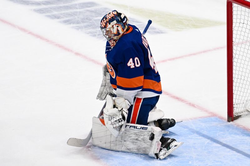 Apr 11, 2024; Elmont, New York, USA; New York Islanders goaltender Semyon Varlamov (40) makes a save against the Montreal Canadiens during the second period at UBS Arena. Mandatory Credit: Dennis Schneidler-USA TODAY Sports