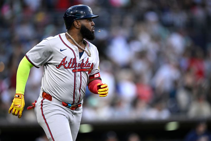 Jul 12, 2024; San Diego, California, USA; Atlanta Braves designated hitter Marcell Ozuna (20) rounds the bases after hitting a home run against the San Diego Padres during the fifth inning at Petco Park. Mandatory Credit: Orlando Ramirez-USA TODAY Sports 