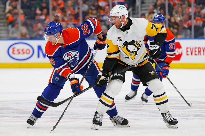 Mar 3, 2024; Edmonton, Alberta, CAN; Edmonton Oilers forward Corey Perry (90) and Pittsburgh Penguins forward Jeff Carter (77) battle for position during the first period at Rogers Place. Mandatory Credit: Perry Nelson-USA TODAY Sports