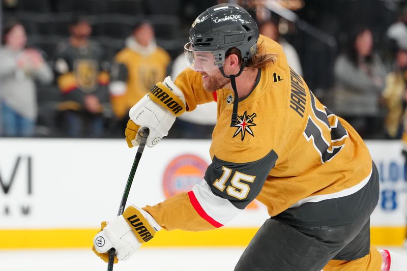 Nov 29, 2024; Las Vegas, Nevada, USA; Vegas Golden Knights defenseman Noah Hanifin (15) warms up before a game against the Winnipeg Jets at T-Mobile Arena. Mandatory Credit: Stephen R. Sylvanie-Imagn Images