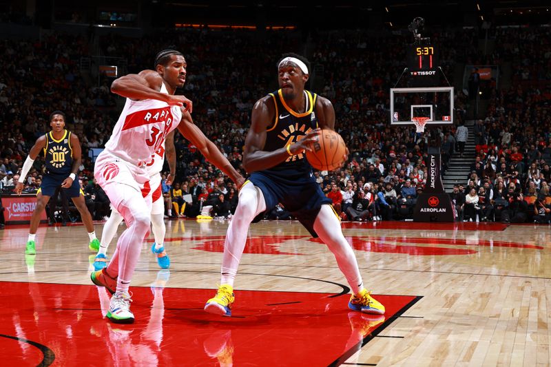 TORONTO, CANADA - NOVEMBER 18: Pascal Siakam #43 of the Indiana Pacers drives to the basket during the game against the Toronto Raptors on November 18, 2024 at the Scotiabank Arena in Toronto, Ontario, Canada.  NOTE TO USER: User expressly acknowledges and agrees that, by downloading and or using this Photograph, user is consenting to the terms and conditions of the Getty Images License Agreement.  Mandatory Copyright Notice: Copyright 2024 NBAE (Photo by Vaughn Ridley/NBAE via Getty Images)