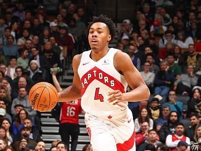 TORONTO, CANADA - DECEMBER 20: Scottie Barnes #4 of the Toronto Raptors brings the ball up court during the game against the Denver Nuggets on December 20, 2023 at the Scotiabank Arena in Toronto, Ontario, Canada.  NOTE TO USER: User expressly acknowledges and agrees that, by downloading and or using this Photograph, user is consenting to the terms and conditions of the Getty Images License Agreement.  Mandatory Copyright Notice: Copyright 2023 NBAE (Photo by Vaughn Ridley/NBAE via Getty Images)