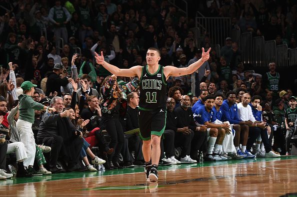 BOSTON, MA - DECEMBER 1: Payton Pritchard #11 of the Boston Celtics celebrates during the game against the Philadelphia 76ers on December 1, 2023 at the TD Garden in Boston, Massachusetts. NOTE TO USER: User expressly acknowledges and agrees that, by downloading and or using this photograph, User is consenting to the terms and conditions of the Getty Images License Agreement. Mandatory Copyright Notice: Copyright 2023 NBAE  (Photo by Brian Babineau/NBAE via Getty Images)