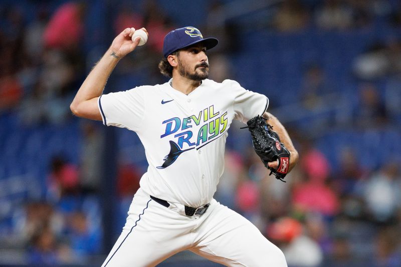 Jun 28, 2024; St. Petersburg, Florida, USA;  Tampa Bay Rays pitcher Zach Eflin (24) throws a pitch against the Washington Nationals in the first inning at Tropicana Field. Mandatory Credit: Nathan Ray Seebeck-USA TODAY Sports