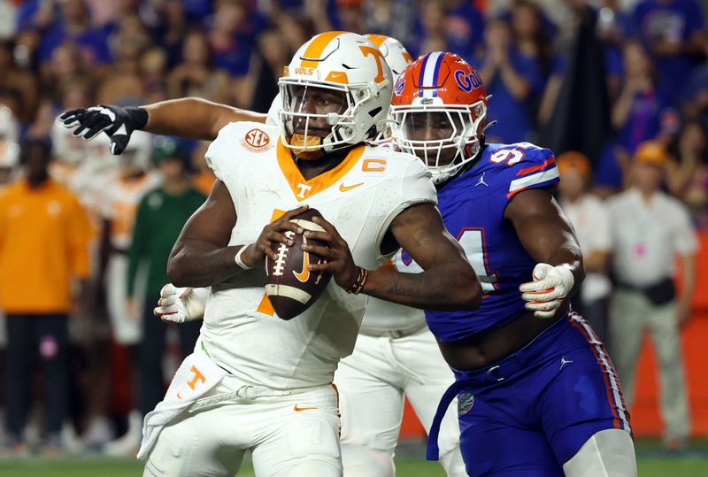 Sep 16, 2023; Gainesville, Florida, USA; Florida Gators defensive lineman Tyreak Sapp (94) sacks Tennessee Volunteers quarterback Joe Milton III (7) during the second quarter at Ben Hill Griffin Stadium. Mandatory Credit: Kim Klement Neitzel-USA TODAY Sports