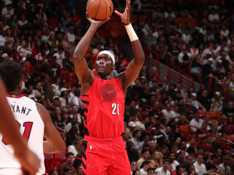 MIAMI, FL - MARCH 29: Duop Reath #26 of the Portland Trail Blazers shoots a three point basket against the Miami Heat on March 29, 2024 at Kaseya Center in Miami, Florida. NOTE TO USER: User expressly acknowledges and agrees that, by downloading and or using this Photograph, user is consenting to the terms and conditions of the Getty Images License Agreement. Mandatory Copyright Notice: Copyright 2024 NBAE (Photo by Issac Baldizon/NBAE via Getty Images)