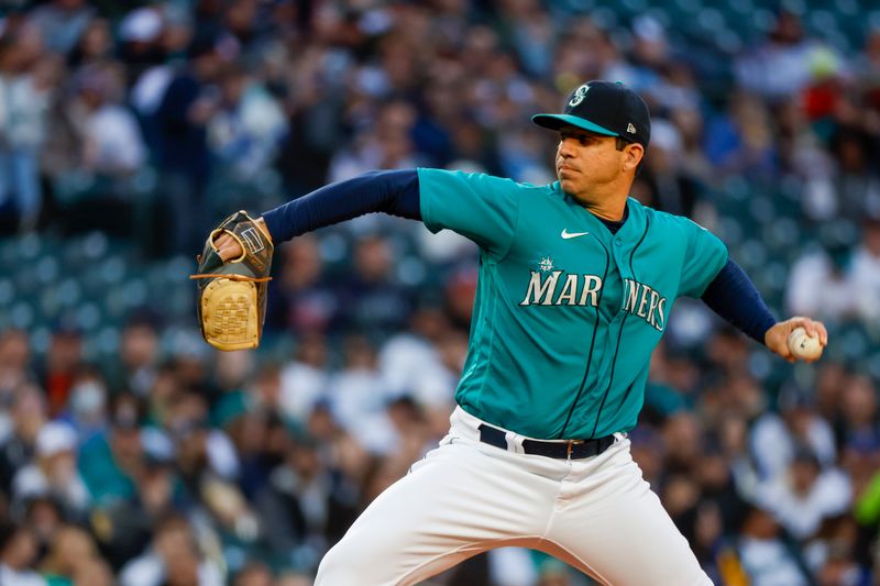 Apr 14, 2023; Seattle, Washington, USA; Seattle Mariners starting pitcher Tommy Milone (53) throws against the Colorado Rockies during the first inning at T-Mobile Park. Mandatory Credit: Joe Nicholson-USA TODAY Sports