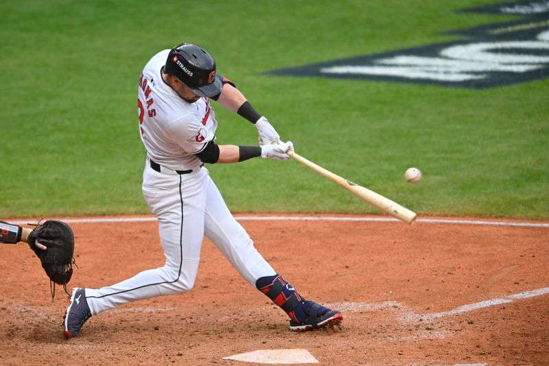 Oct 12, 2024; Cleveland, Ohio, USA; Cleveland Guardians outfielder Lane Thomas (8) gets a hit in the seventh inning against the Detroit Tigers during game five of the ALDS for the 2024 MLB Playoffs at Progressive Field. Mandatory Credit: David Richard-Imagn Images