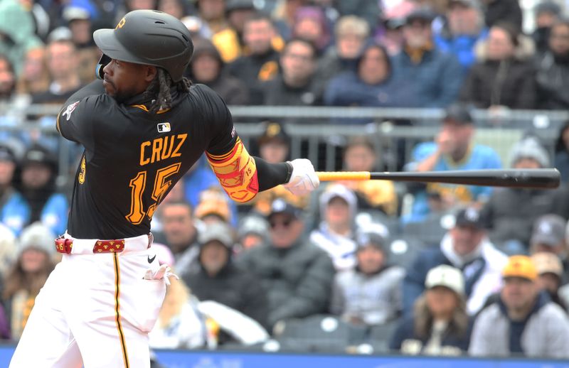 Apr 6, 2025; Pittsburgh, Pennsylvania, USA;  Pittsburgh Pirates center fielder Oneil Cruz (15) hits a single against the New York Yankees during the third inning at PNC Park. Mandatory Credit: Charles LeClaire-Imagn Images