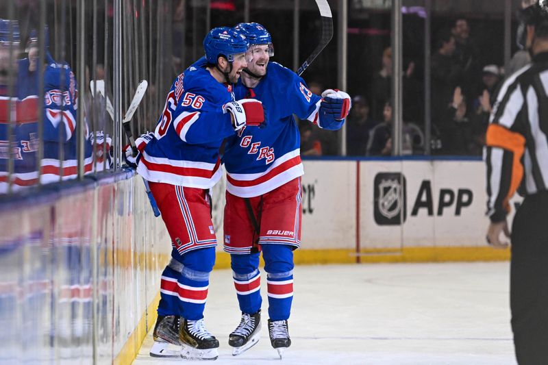 Feb 5, 2024; New York, New York, USA;  New York Rangers left wing Alexis Lafreniere (13) celebrates his game winning goal during the overtime period against the Colorado Avalanche with New York Rangers defenseman Erik Gustafsson (56) at Madison Square Garden. Mandatory Credit: Dennis Schneidler-USA TODAY Sports