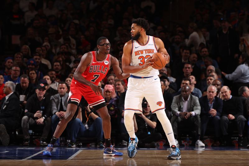 NEW YORK, NY - NOVEMBER 13: Karl-Anthony Towns #32 of the New York Knicks handles the ball during the game against the Chicago Bulls on November 13, 2024 at Madison Square Garden in New York City, New York.  NOTE TO USER: User expressly acknowledges and agrees that, by downloading and or using this photograph, User is consenting to the terms and conditions of the Getty Images License Agreement. Mandatory Copyright Notice: Copyright 2024 NBAE  (Photo by Joe Murphy/NBAE via Getty Images)