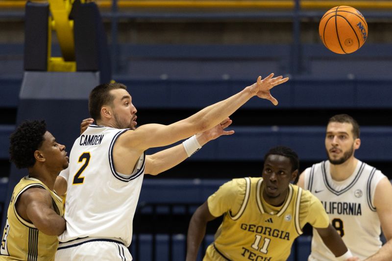 Feb 4, 2026; Berkeley, California, USA; California Golden Bears forward John Camden (2) passes against Georgia Tech Yellow Jackets guard Jaeden Mustaf during the first half at Haas Pavilion. Mandatory Credit: D. Ross Cameron-Imagn Images
