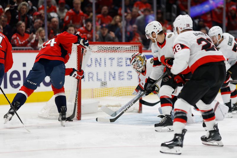 Mar 3, 2025; Washington, District of Columbia, USA; Washington Capitals center Connor McMichael (24) scores a goal on Ottawa Senators goaltender Linus Ullmark (35) in the first period at Capital One Arena. Mandatory Credit: Geoff Burke-Imagn Images