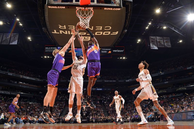 PHOENIX, AZ - OCTOBER 28: Torrey Craig #0 of the Phoenix Suns drives to the basket during the game against the New Orleans Pelicans on October 28, 2022 at Footprint Center in Phoenix, Arizona. NOTE TO USER: User expressly acknowledges and agrees that, by downloading and or using this photograph, user is consenting to the terms and conditions of the Getty Images License Agreement. Mandatory Copyright Notice: Copyright 2022 NBAE (Photo by Barry Gossage/NBAE via Getty Images)