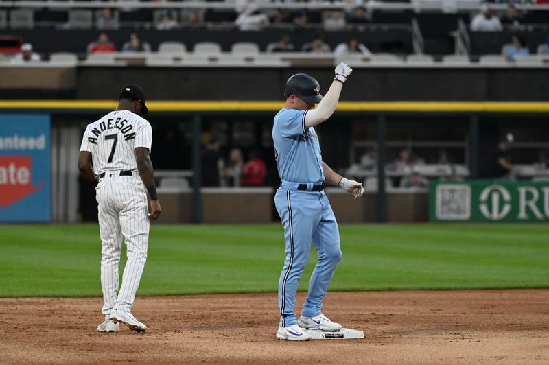 Jul 6, 2023; Chicago, Illinois, USA;  Toronto Blue Jays third baseman Matt Chapman (26) gestures after he hits a double against the Chicago White Sox during the first inning at Guaranteed Rate Field. Mandatory Credit: Matt Marton-USA TODAY Sports