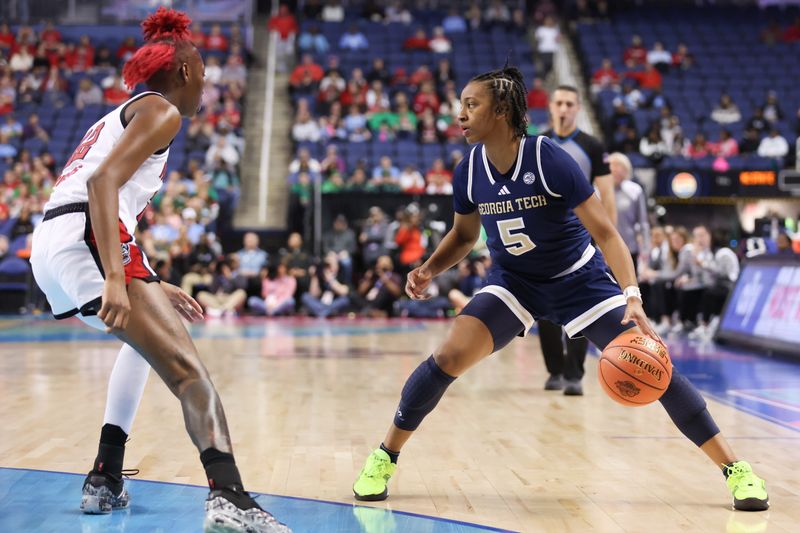 Mar 7, 2025; Greensboro, NC, USA;  Georgia Tech Yellow Jackets guard Tonie Morgan (5) sets the play during the second quarter against NC State Wolfpack at First Horizon Coliseum. Mandatory Credit: Cory Knowlton-Imagn Images