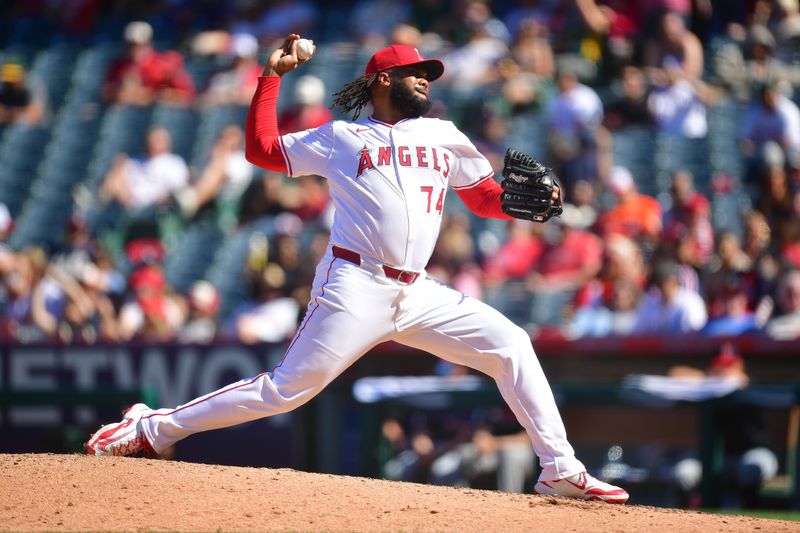Apr 6, 2025; Anaheim, California, USA; Los Angeles Angels pitcher Kenley Jansen (74) throws against the Cleveland Guardians during the ninth inning at Angel Stadium. Mandatory Credit: Gary A. Vasquez-Imagn Images