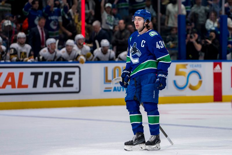 Apr 8, 2024; Vancouver, British Columbia, CAN; Vancouver Canucks defenseman Quinn Hughes (43) celebrates his goal against the Vegas Golden Knights in the first period  at Rogers Arena. Mandatory Credit: Bob Frid-USA TODAY Sports