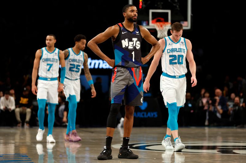 NEW YORK, NEW YORK - NOVEMBER 30: Mikal Bridges #1 of the Brooklyn Nets reacts during the second half against the Charlotte Hornets at Barclays Center on November 30, 2023 in the Brooklyn borough of New York City. The Hornets won 129-128. NOTE TO USER: User expressly acknowledges and agrees that, by downloading and/or using this Photograph, user is consenting to the terms and conditions of the Getty Images License Agreement. (Photo by Sarah Stier/Getty Images)