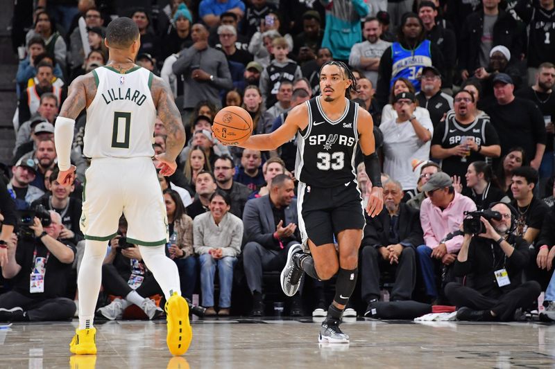 SAN ANTONIO, TX - JANUARY 4: Tre Jones #33 of the San Antonio Spurs dribbles the ball during the game against the Milwaukee Bucks on January 4, 2024 at the Frost Bank Center in San Antonio, Texas. NOTE TO USER: User expressly acknowledges and agrees that, by downloading and or using this photograph, user is consenting to the terms and conditions of the Getty Images License Agreement. Mandatory Copyright Notice: Copyright 2024 NBAE (Photos by Michael Gonzales/NBAE via Getty Images)