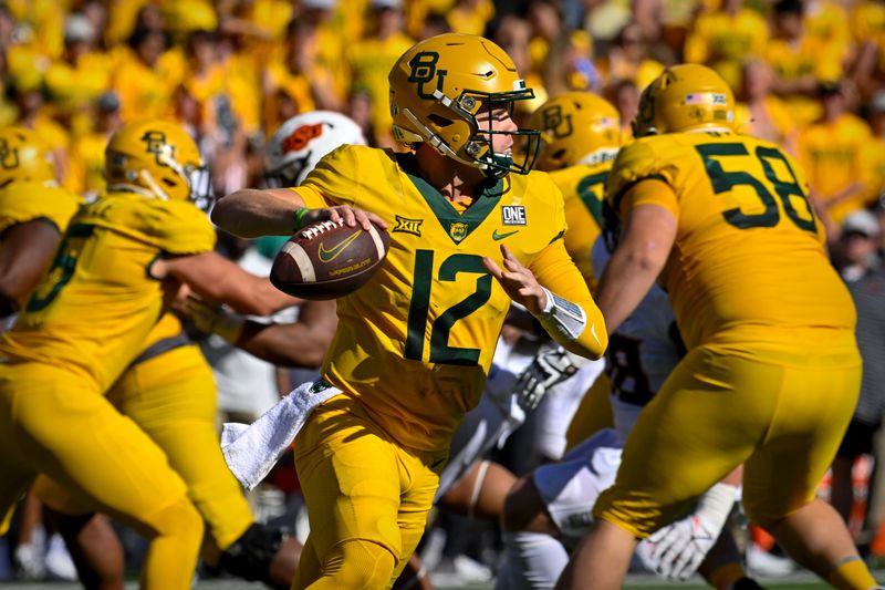 Oct 1, 2022; Waco, Texas, USA; Baylor Bears quarterback Blake Shapen (12) rolls out to pass against the Oklahoma State Cowboys during the second half at McLane Stadium. Mandatory Credit: Jerome Miron-USA TODAY Sports