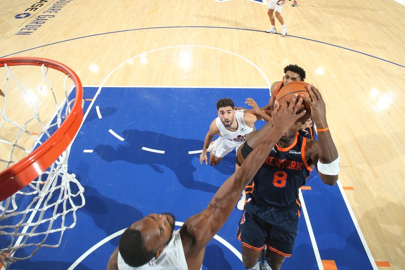 NEW YORK, NY - OCTOBER 28: Evan Mobley #4 of the Cleveland Cavaliers blocks a shot during the game against the New York Knicks on October 28, 2024 at Madison Square Garden in New York City, New York.  NOTE TO USER: User expressly acknowledges and agrees that, by downloading and or using this photograph, User is consenting to the terms and conditions of the Getty Images License Agreement. Mandatory Copyright Notice: Copyright 2024 NBAE  (Photo by Nathaniel S. Butler/NBAE via Getty Images)