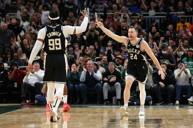 MILWAUKEE, WISCONSIN - JANUARY 26: Pat Connaughton #24 of the Milwaukee Bucks reacts to a three point shot during a game against the Cleveland Cavaliers at Fiserv Forum on January 26, 2024 in Milwaukee, Wisconsin. NOTE TO USER: User expressly acknowledges and agrees that, by downloading and or using this photograph, User is consenting to the terms and conditions of the Getty Images License Agreement. (Photo by Stacy Revere/Getty Images)