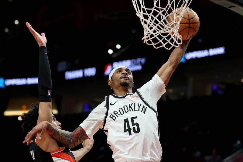 PORTLAND, OREGON - JANUARY 14: Keon Johnson #45 of the Brooklyn Nets shoots against Portland Trail Blazers during the second half at Moda Center on January 14, 2025 in Portland, Oregon. NOTE TO USER: User expressly acknowledges and agrees that, by downloading and or using this photograph, User is consenting to the terms and conditions of the Getty Images License Agreement. (Photo by Steph Chambers/Getty Images)