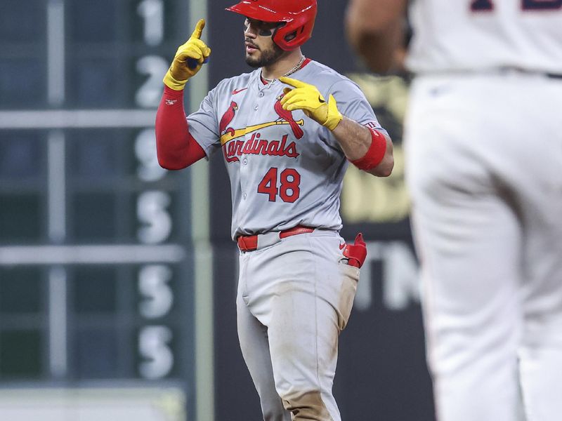 Jun 4, 2024; Houston, Texas, USA; St. Louis Cardinals catcher Ivan Herrera (48) celebrates after hitting a double during the seventh inning against the Houston Astros at Minute Maid Park. Mandatory Credit: Troy Taormina-USA TODAY Sports