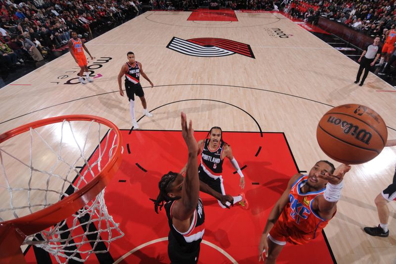 PORTLAND, OR - NOVEMBER 1: Aaron Wiggins #21 of the Oklahoma City Thunder drives to the basket during the game against the Portland Trail Blazers on November 1, 2024 at the Moda Center Arena in Portland, Oregon. NOTE TO USER: User expressly acknowledges and agrees that, by downloading and or using this photograph, user is consenting to the terms and conditions of the Getty Images License Agreement. Mandatory Copyright Notice: Copyright 2024 NBAE (Photo by Cameron Browne/NBAE via Getty Images)