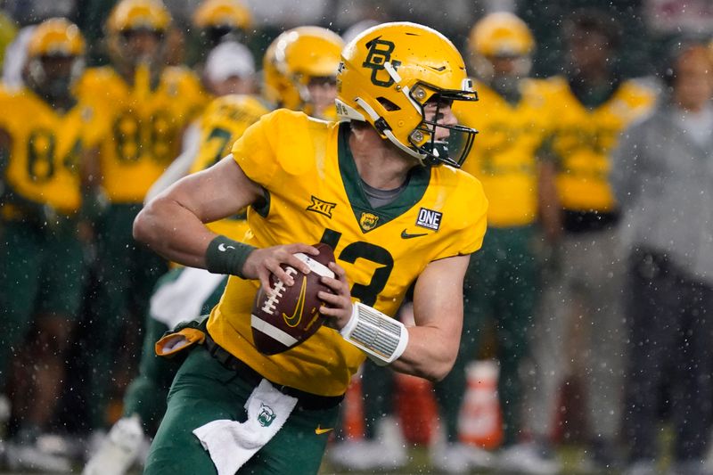 Nov 25, 2023; Waco, Texas, USA; Baylor Bears quarterback Sawyer Robertson (13) carries the ball against the West Virginia Mountaineers during the first half at McLane Stadium. Mandatory Credit: Raymond Carlin III-USA TODAY Sports