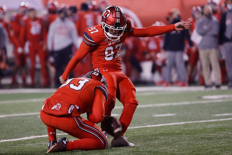 Dec 5, 2020; Salt Lake City, Utah, USA; Utah Utes place kicker Jadon Redding (97) kicks a field goal in the first quarter against the Oregon State Beavers  at Rice-Eccles Stadium. Mandatory Credit: Jeffrey Swinger-USA TODAY Sports