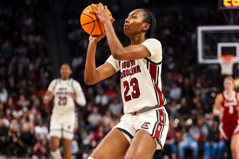 Feb 22, 2024; Columbia, South Carolina, USA; South Carolina Gamecocks guard Bree Hall (23) shoots against the Alabama Crimson Tide in the first half at Colonial Life Arena. Mandatory Credit: Jeff Blake-USA TODAY Sports