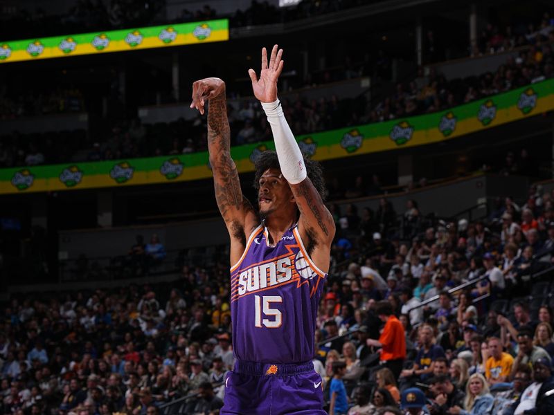 DENVER, CO - OCTOBER 13: Jalen Bridges #15 of the Phoenix Suns shoots a three point basket during the game against the Denver Nuggets on October 13, 2024 at Ball Arena in Denver, Colorado. NOTE TO USER: User expressly acknowledges and agrees that, by downloading and/or using this Photograph, user is consenting to the terms and conditions of the Getty Images License Agreement. Mandatory Copyright Notice: Copyright 2024 NBAE (Photo by Garrett Ellwood/NBAE via Getty Images)