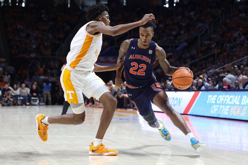 Feb 4, 2023; Knoxville, Tennessee, USA; Tennessee Volunteers forward Julian Phillips (2) defends Auburn Tigers guard Allen Flanigan (22) during the second half at Thompson-Boling Arena. Mandatory Credit: Randy Sartin-USA TODAY Sports