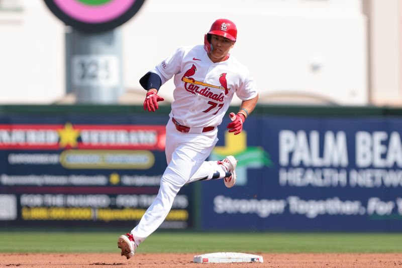 Feb 27, 2026; Jupiter, Florida, USA; St. Louis Cardinals designated hitter JJ Wetherholt (77) rounds the bases after hitting a home run against the New York Mets during the fourth inning at Roger Dean Chevrolet Stadium. Mandatory Credit: Sam Navarro-Imagn Images