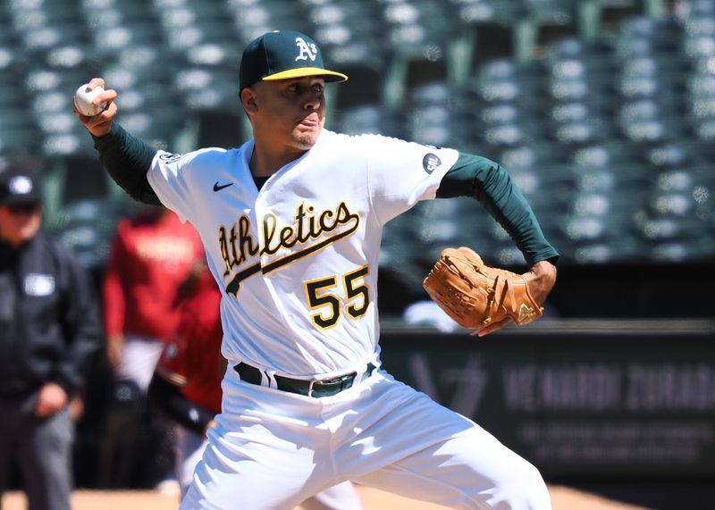 May 17, 2023; Oakland, California, USA; Oakland Athletics relief pitcher Adrian Martinez (55) pitches the ball against the Arizona Diamondbacks during the ninth inning at Oakland-Alameda County Coliseum. Mandatory Credit: Kelley L Cox-USA TODAY Sports