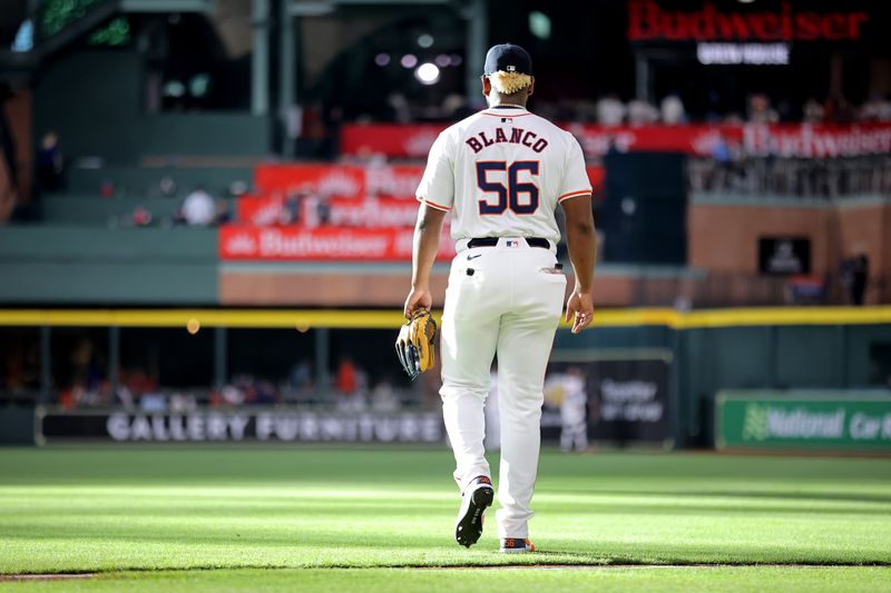 May 14, 2024; Houston, Texas, USA; Houston Astros starting pitcher Ronel Blanco (56) walks to the bullpen to warm up prior to the game against the Oakland Athletics at Minute Maid Park. Mandatory Credit: Erik Williams-USA TODAY Sports